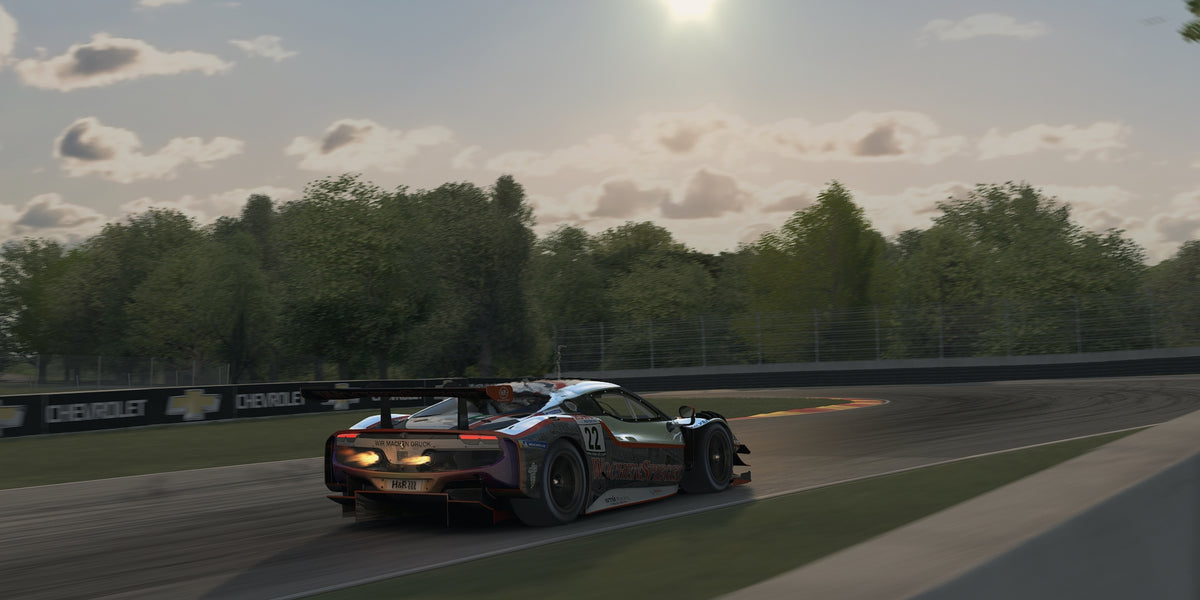 Voiture de course dans un virage sur circuit